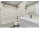 Neat bathroom with white cabinets, shower, and sink with chrome faucet at 2000 N 36Th St # 35, Phoenix, AZ 85008