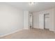 Bedroom features plush carpet, closet, and entry door for easy accessibility at 2000 N 36Th St # 35, Phoenix, AZ 85008
