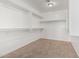Walk-in closet with shelves and carpet floors at 2000 N 36Th St # 35, Phoenix, AZ 85008