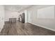 Modern kitchen features white cabinetry, stainless appliances, and hardwood floors at 2000 N 36Th St # 35, Phoenix, AZ 85008