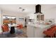 This kitchen boasts modern appliances and an eat-in dining space with chairs at 2331 E Delgado St, Phoenix, AZ 85022