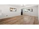 Spacious living room with wood-look floors and great natural lighting at 2331 E Delgado St, Phoenix, AZ 85022