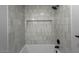 Close-up of a tiled shower and tub combo at 2331 E Delgado St, Phoenix, AZ 85022