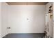 Interior view of utility room with a water heater and electrical outlets at 2331 E Delgado St, Phoenix, AZ 85022