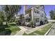 Inviting condo exterior showcasing staircase access and manicured landscaping at 2333 E Southern Ave # 1015, Tempe, AZ 85282