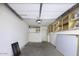 Spacious garage with storage cabinets and lighting at 2333 E Southern Ave # 1015, Tempe, AZ 85282