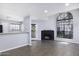 Bright living room with fireplace and expansive windows at 2333 E Southern Ave # 1015, Tempe, AZ 85282