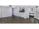 Open-concept living area with view of the kitchen area and access to patio at 2333 E Southern Ave # 1015, Tempe, AZ 85282