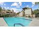 Enjoy the community swimming pool and spa with comfortable poolside seating and mature landscape at 2333 E Southern Ave # 1015, Tempe, AZ 85282