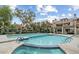 Community swimming pool and spa with comfortable poolside seating and mature landscape at 2333 E Southern Ave # 1015, Tempe, AZ 85282