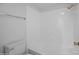 Bright bathroom features a tiled shower and bathtub with a neutral color palette at 2625 E Indian School E Rd # 115, Phoenix, AZ 85016