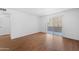 Bright, airy bedroom with wood floors and access to outdoor patio at 2625 E Indian School E Rd # 115, Phoenix, AZ 85016