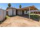 Backyard featuring a covered patio and a view of the sky, with an unfinished landscape at 3302 W Turney Ave, Phoenix, AZ 85017