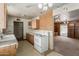 Kitchen featuring an old range and wooden cabinets at 3302 W Turney Ave, Phoenix, AZ 85017