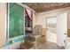 Basement stairs with tile floors and access to the backyard at 4065 E University Dr # 141, Mesa, AZ 85205
