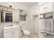 Bathroom featuring a vanity, toilet and built in storage at 4065 E University Dr # 141, Mesa, AZ 85205