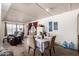 Open-concept living area blending a cozy seating area with a dining table for convenient living at 4065 E University Dr # 141, Mesa, AZ 85205