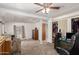 An office space featuring a desk, a black office chair and closet at 4065 E University Dr # 141, Mesa, AZ 85205