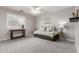 Cozy bedroom featuring neutral walls, plush carpet, and a comfortable daybed with stylish decor and bright, natural light at 4202 E Broadway Rd # 130, Mesa, AZ 85206