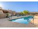 Resort-style community pool area with comfortable seating, a covered patio, and inviting crystal-clear water at 4202 E Broadway Rd # 130, Mesa, AZ 85206