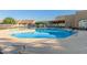 Beautiful community pool offering a relaxing oasis with ample seating and clear blue water in a shared space at 4202 E Broadway Rd # 130, Mesa, AZ 85206