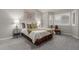 Neutral bedroom featuring a Queen bed, a window with shutters, and carpeted floors at 4202 E Broadway Rd # 130, Mesa, AZ 85206