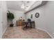 Well-lit home office with tiled floor, a neutral paint palette, and vaulted ceiling for a productive workspace at 4202 E Broadway Rd # 130, Mesa, AZ 85206