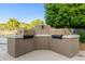 Convenient community outdoor kitchen with built-in grills and ample counter space, perfect for outdoor entertaining at 4202 E Broadway Rd # 130, Mesa, AZ 85206