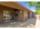 Covered patio offers a relaxing outdoor space with privacy screens and a view of the backyard at 4202 E Broadway Rd # 130, Mesa, AZ 85206