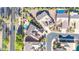 Aerial view of a backyard pool and putting green with solar panels in a suburban neighborhood at 42318 W Abbey Rd, Maricopa, AZ 85138