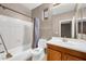 Bathroom featuring a shower and wood vanity at 42318 W Abbey Rd, Maricopa, AZ 85138