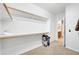 Walk-in closet with ample shelving and hanging space at 42318 W Abbey Rd, Maricopa, AZ 85138