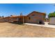 View of the backyard featuring a covered patio and ample space at 4336 E Aspen Ave, Mesa, AZ 85201