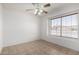 The room features light tile flooring and a single window overlooking the exterior at 4336 E Aspen Ave, Mesa, AZ 85201
