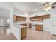 Kitchen featuring tile floors, white countertops, and wood cabinetry at 4336 E Aspen Ave, Mesa, AZ 85201