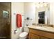 Modern bathroom with a tiled walk-in shower, granite countertop vanity, and updated fixtures at 5438 E Avalon Dr, Phoenix, AZ 85018