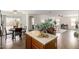 Open-concept living room and dining area with natural light and modern décor at 6515 W Hughes Dr, Phoenix, AZ 85043