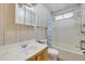 Neutral bathroom features a single sink vanity, medicine cabinet and shower at 6960 W Peoria Ave # 74, Peoria, AZ 85345