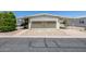 Charming single-story home with a carport, desert landscaping, and a cozy, inviting facade at 6960 W Peoria Ave # 74, Peoria, AZ 85345