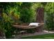 Hammock nestled between trees in a tranquil and private backyard at 8068 E Del Trigo Rd, Scottsdale, AZ 85258