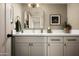 Bathroom vanity featuring gray cabinetry, a white countertop, and modern finishes at 8068 E Del Trigo Rd, Scottsdale, AZ 85258