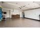 Spacious garage with epoxy flooring, storage cabinets, and organized storage for a clean look at 8068 E Del Trigo Rd, Scottsdale, AZ 85258