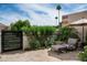Cozy outdoor patio featuring comfortable seating, mature trees, and a serene atmosphere perfect for relaxing at 8068 E Del Trigo Rd, Scottsdale, AZ 85258