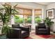 Cozy sitting area with comfortable chairs, a bay window, and stylish decor, perfect for reading at 8068 E Del Trigo Rd, Scottsdale, AZ 85258