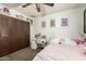 Cozy bedroom with closet, desk and bed at 8602 N 41St Ave, Phoenix, AZ 85051
