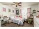 Bright bedroom with comfortable bed, desk and chair at 8602 N 41St Ave, Phoenix, AZ 85051