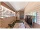 Charming entrance featuring brick walls, a patterned rug, and an inviting atmosphere at 8602 N 41St Ave, Phoenix, AZ 85051