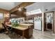 Functional kitchen with a breakfast bar, white appliances, and ample counter space at 8602 N 41St Ave, Phoenix, AZ 85051