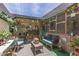Cozy covered patio with comfortable seating and charming decor, perfect for relaxation and entertaining at 8602 N 41St Ave, Phoenix, AZ 85051