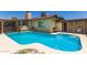 Sparkling pool surrounded by a patio, creating an ideal space for outdoor enjoyment and entertaining at 8602 N 41St Ave, Phoenix, AZ 85051